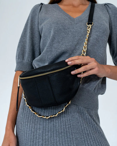 Woman with Arlington Milne Zara Sling Bag - Black