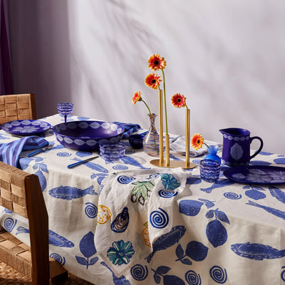 dining table with bonnie and beil linen table cloth with blue sardines design print