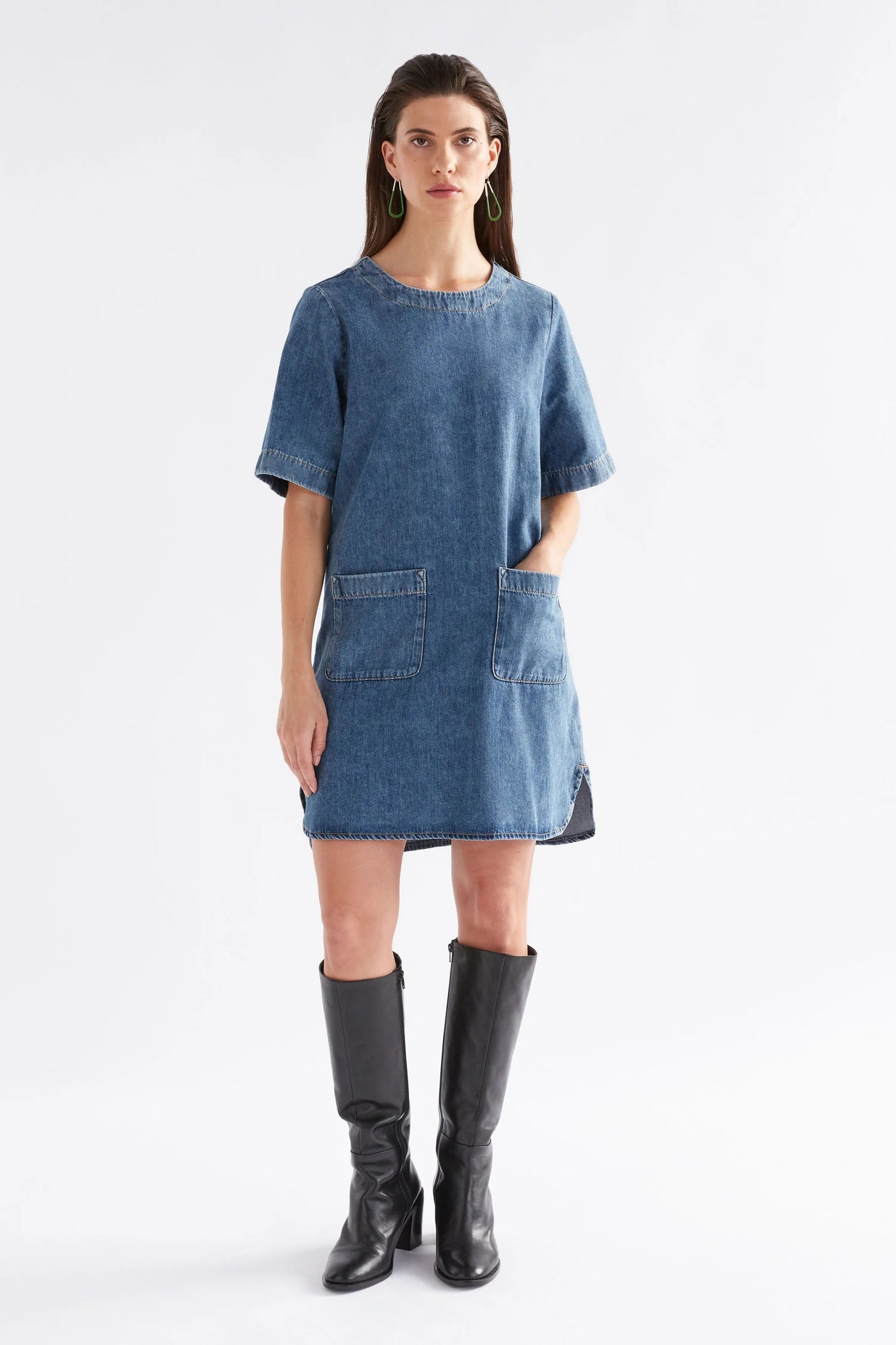 Woman wearing Rittra Dress in Chambray blue and boots