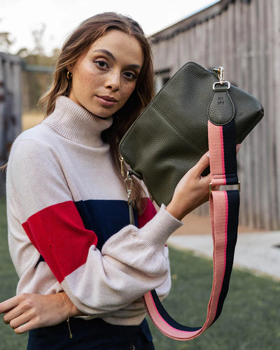 Woman holding Elm and King Burbank Crossbody Large Bag in Khaki