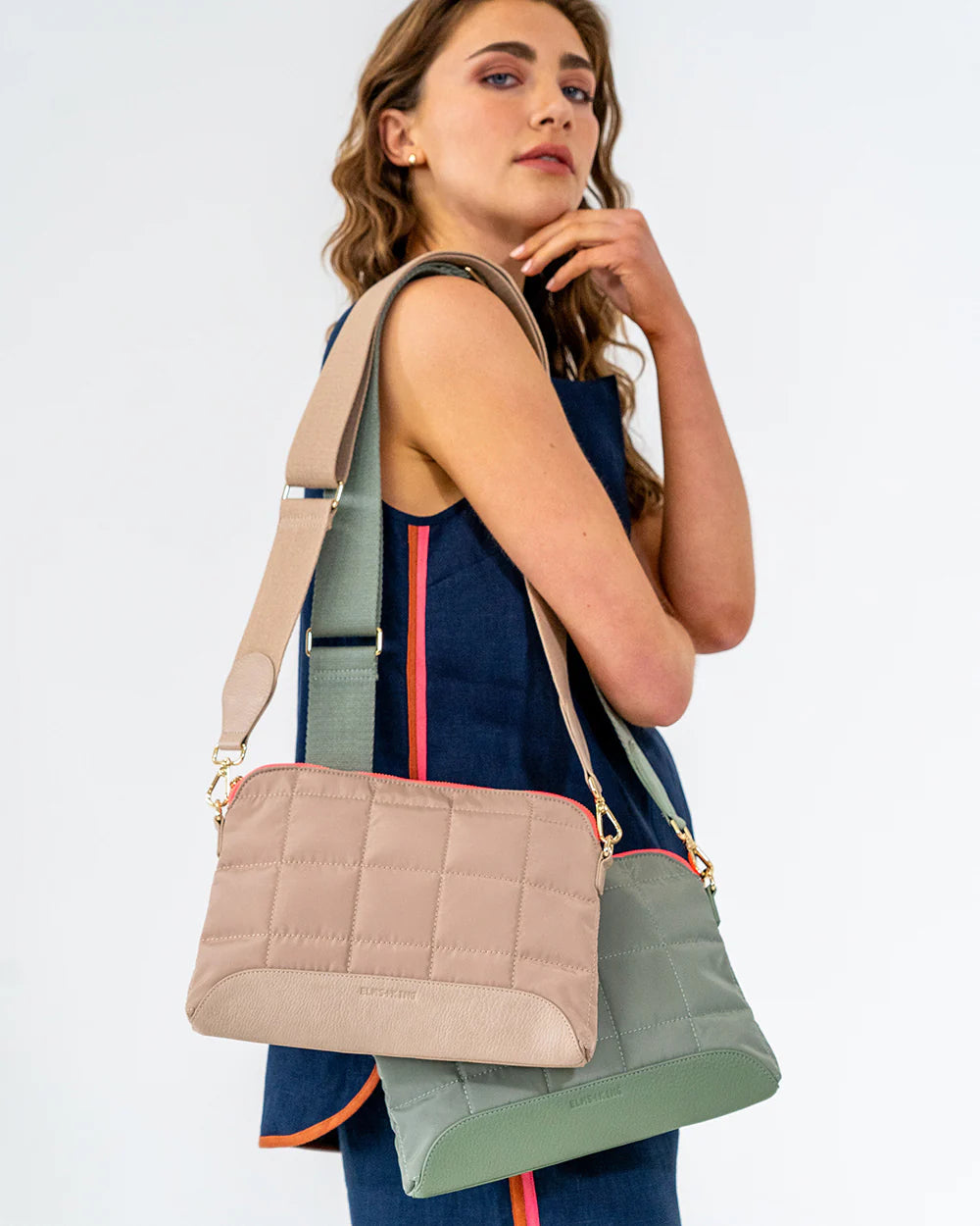 Woman using two crossbody bag