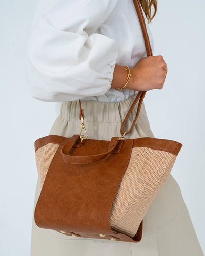 woman using Carnegie Tote - Natural/Tan wider sides