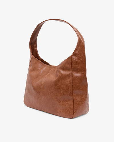 Arcadia Tote in Tan Pebble tilted