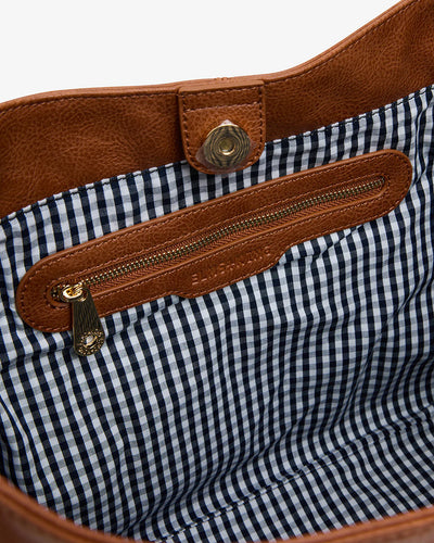 Closer look of the inside pocket and the checkered design of the inside of the bag