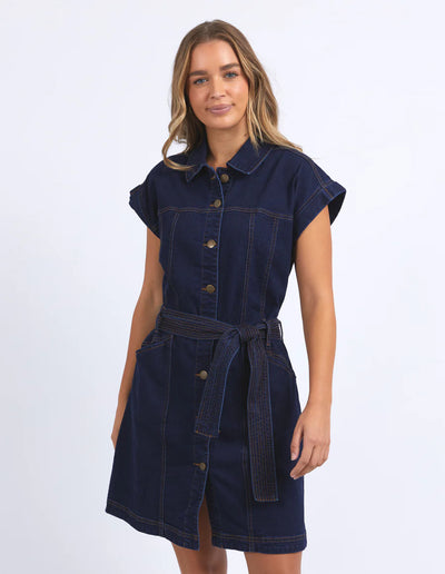 Woman wearing foxwood heidi dress in dark blue denim