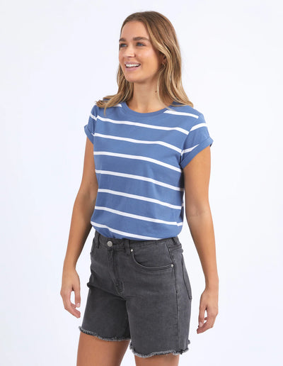 Woman wearing foxwood manly blue and white stripe tee and black denim short