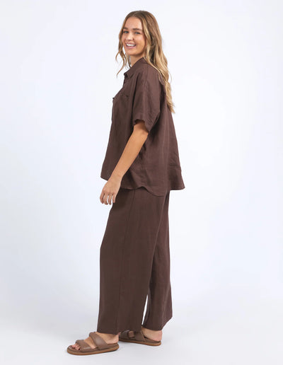 Woman wearing foxwood pierra shirt  and pants in chocolate colour