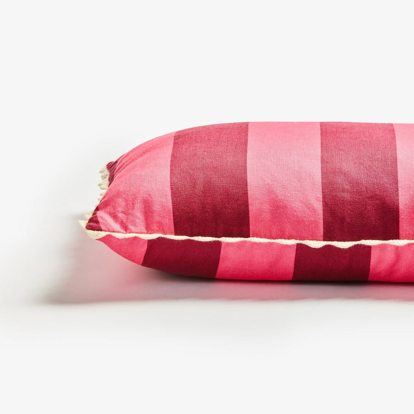 side view bonnie and neil big stripe cerise 60cm x 40 cm cushion