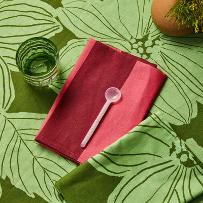 flower printed table cloth in green with bonnie and neil big stripe cerise napkins