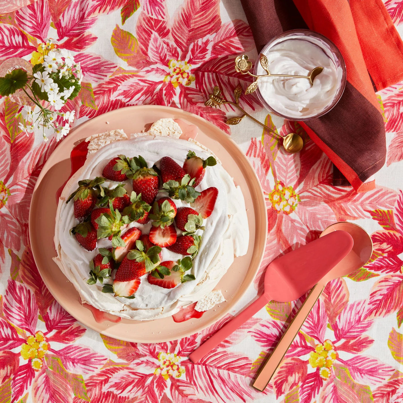 top view of food on the table with bonnie and neil poinsettia red round tablecloth