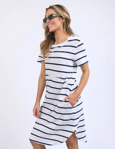 woman wearing sunglass and foxwood bay stripe dress in black white stripe