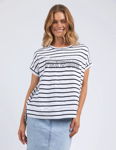 woman wearing foxwood throw on tee white navy stripe and denim skirt