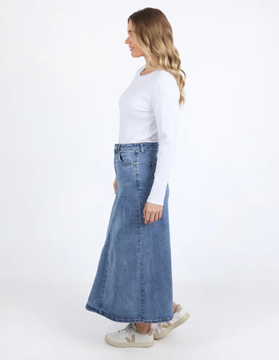 Woman wearing white long sleeve top and Foxwood Parsons Comfort Midi Skirt in Classic Wash Denim