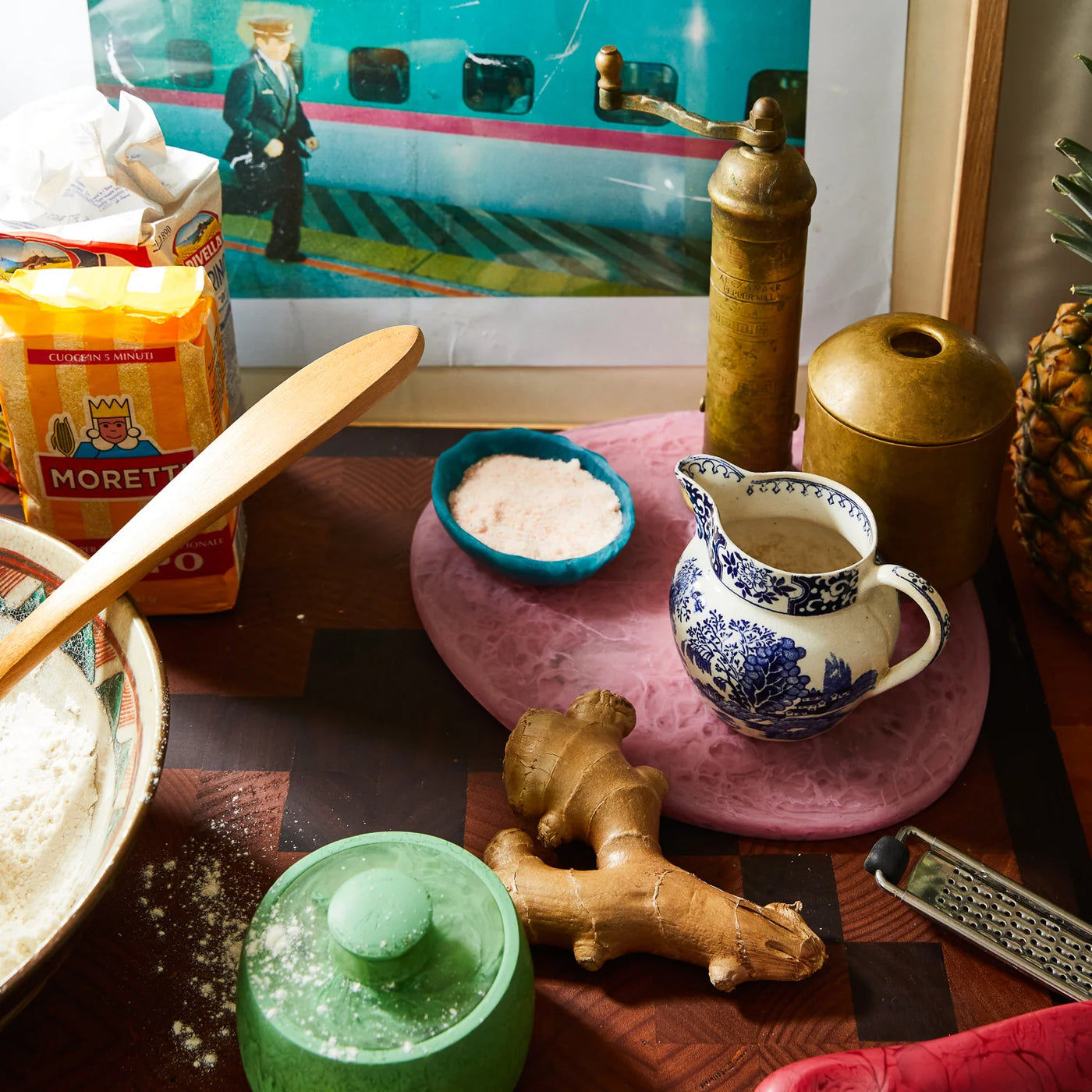 table with kitchen items and board