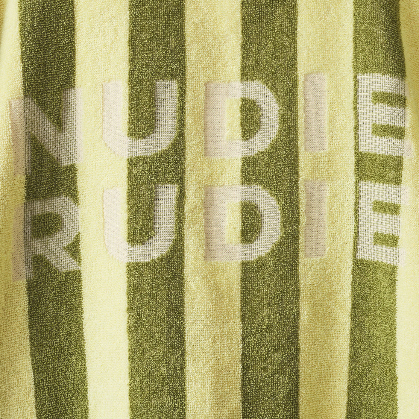 closer look to the nudie rudie print in the sage and clare jarita hooded towel in palm colour