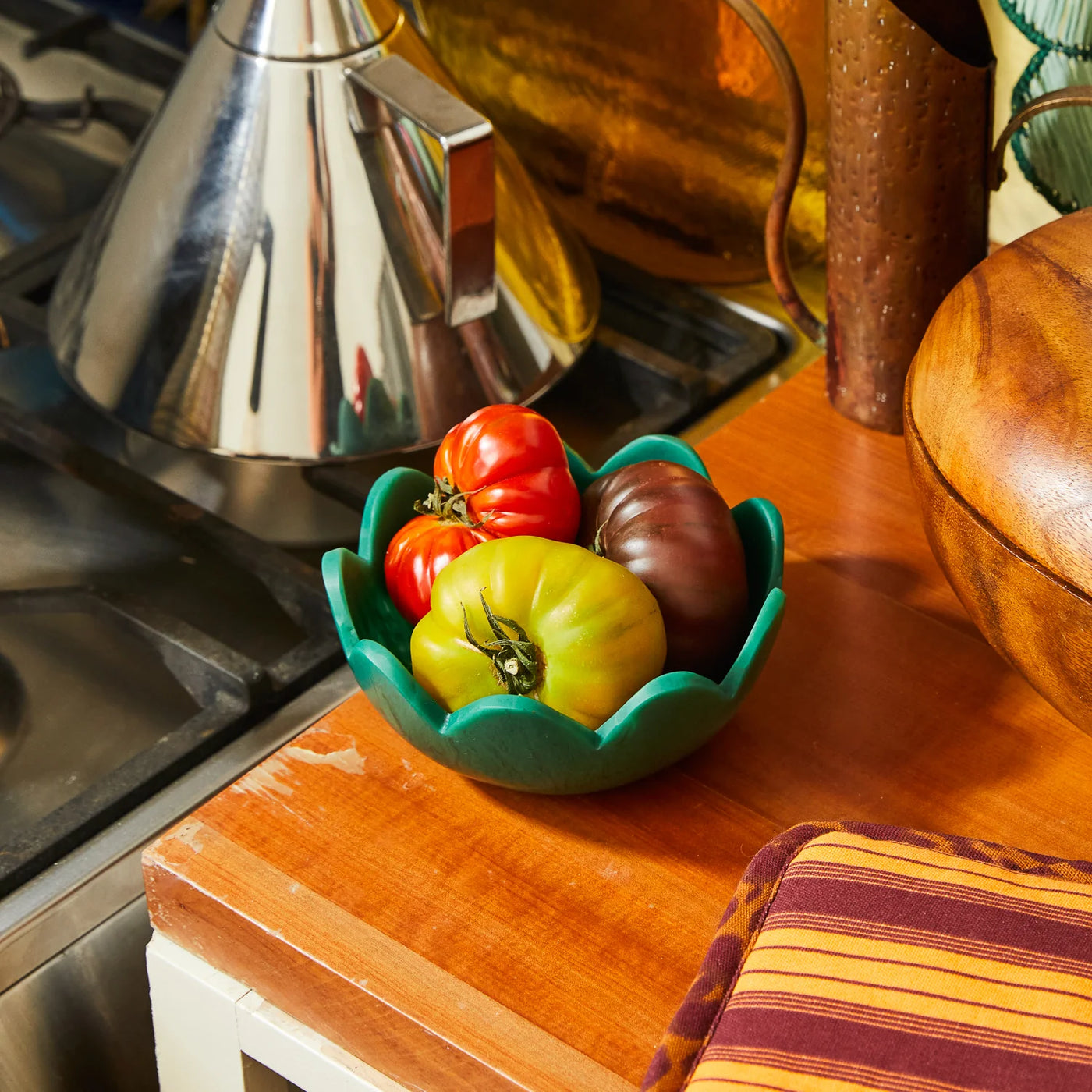 table with petal bowl in forest colour 